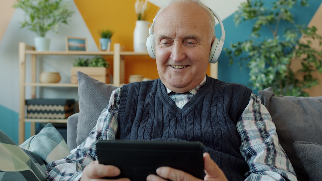 senior using tablet for telehealth appointment - Medicare Suboxone doctors