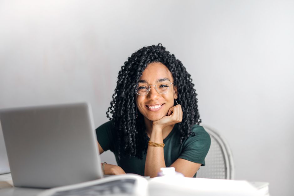 person using laptop for telehealth appointment - online suboxone treatment that accepts medicaid