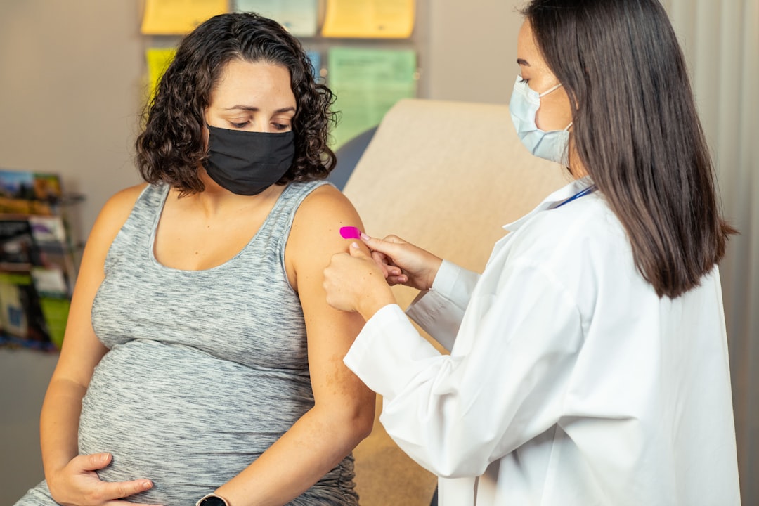 pregnant patient consulting healthcare provider